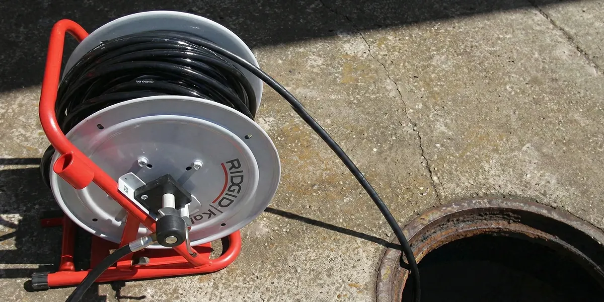 sewer rodding equipment prepared to clear clogged sewer lines in Reno, NV